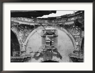 A Boy Framed In The Window Of A Ruined Cathedral; The Cathedral Was Destroyed In A 1773 Earthquake by Luis Marden Pricing Limited Edition Print image