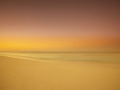 Sunset On Cable Beach, Nassau, Bahamas by Geoff George Pricing Limited Edition Print image