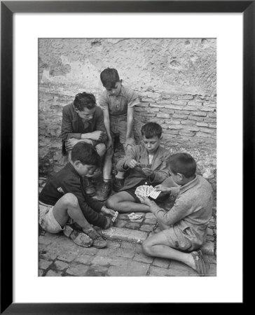 Boys Playing Cards On Steps In Town by Dmitri Kessel Pricing Limited Edition Print image