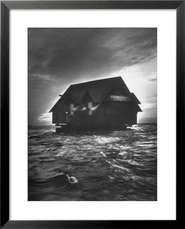 House Being Relocated By Water From Kennebunk Port To Goose Rocks Beach by Yale Joel Pricing Limited Edition Print image