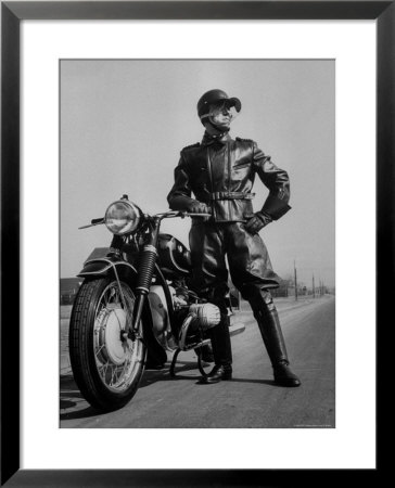 Front Shot Of A German Made Bmw Motorcycle And Rider by Ralph Crane Pricing Limited Edition Print image