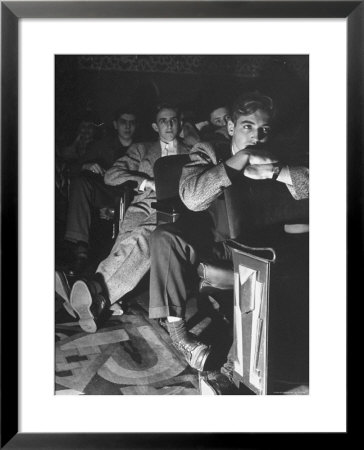 The Local Movie Theater, Boys Have A Very Difficult Time Finding A Place To Put Their Long Legs by Nina Leen Pricing Limited Edition Print image