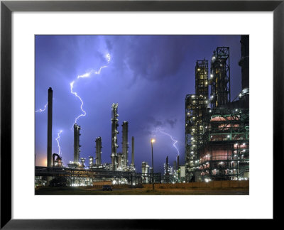 Lightning During Thunderstorm Above Petrochemical Industry In The Antwerp Harbour, Belgium by Philippe Clement Pricing Limited Edition Print image
