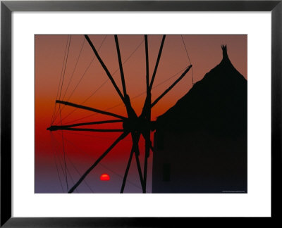 Silhouette Of Windmill At Sunset, Oia, Santorini (Thira), Cyclades Islands, Greece by Marco Simoni Pricing Limited Edition Print image