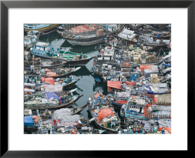 Aerial View Of Dhow Wharves, Deira, Dubai, United Arab Emirates by Walter Bibikow Pricing Limited Edition Print image