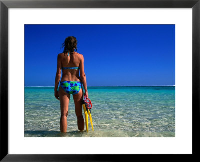 Woman Standing In Turquoise Bay, Ningaloo Marine Park, Australia by Peter Ptschelinzew Pricing Limited Edition Print image