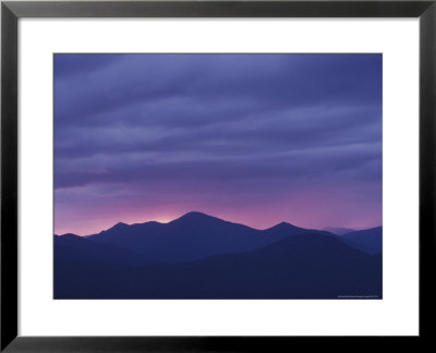 The Setting Sun Drops Behind The Adirondack's Mount Marcy by Michael Melford Pricing Limited Edition Print image