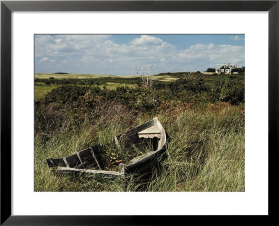 Broken Old Rowboat Cushioned In Tall Wild Grass, With A View Of A House In Distance by Alfred Eisenstaedt Pricing Limited Edition Print image
