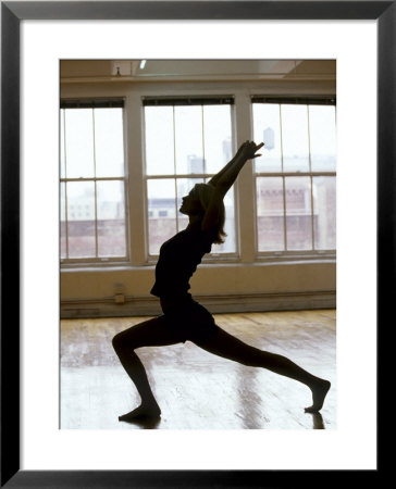 Young Women Stretching During Exercise Session, New York, New York, Usa by Chris Trotman Pricing Limited Edition Print image