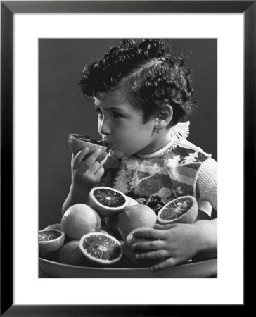 Little Girl Sucking An Orange by A. Villani Pricing Limited Edition Print image
