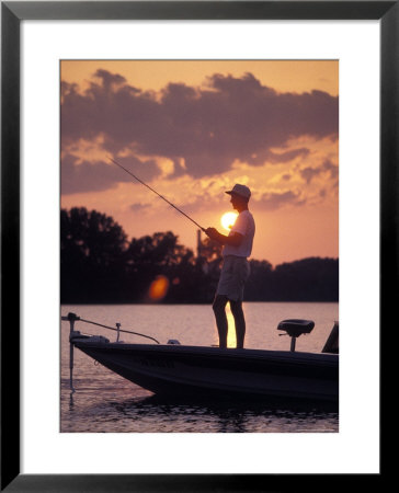 Man Fishes During Sunset On The James River Near Shirley Plantation In Virginia by Richard Nowitz Pricing Limited Edition Print image