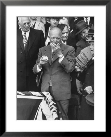Pres. Dwight D. Eisenhower, Applying A Wet Whammy To First Official Baseball Of Washington Season by George Skadding Pricing Limited Edition Print image