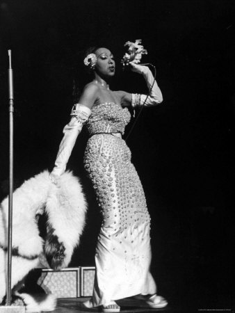 Entertainer Josephine Baker, Clad In A Gown Designed By Christian Dior by Alfred Eisenstaedt Pricing Limited Edition Print image