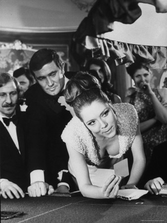 Diana Rigg And George Lazenby On Location For Her Majesty's Secret Service by Terence Spencer Pricing Limited Edition Print image