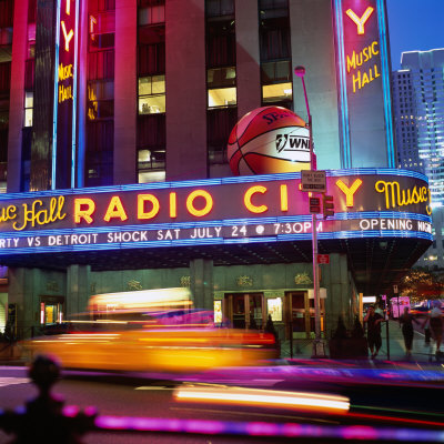 Neon Lights Of Radio City Music Hall, New York City, United States Of America by Corey Wise Pricing Limited Edition Print image
