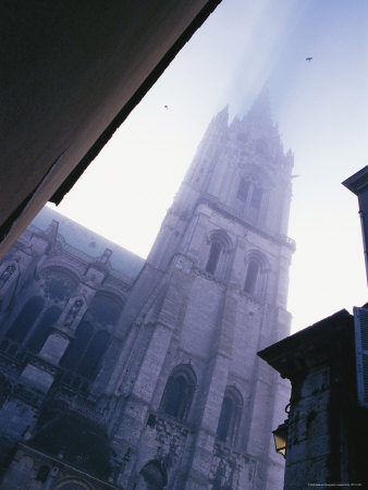 View Of The High Gothic Chartres Cathedral Shrouded In A Morning Mist by Stephen Sharnoff Pricing Limited Edition Print image