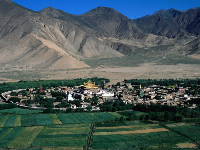 Samye Monastery With Mountain Peaks In Distance, Samye Monastery, Tibet by Bill Wassman Pricing Limited Edition Print image