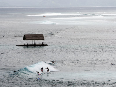 Surfers Catching A Wave by Andrew Brownbill Pricing Limited Edition Print image