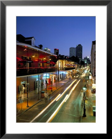 Bourbon Street And City Skyline At Night, New Orleans, Louisiana, Usa by Gavin Hellier Pricing Limited Edition Print image