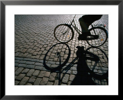 Shade Of Cyclist Crossing Amalienborg Slotsplads, Copenhagen, Denmark by Martin Lladó Pricing Limited Edition Print image