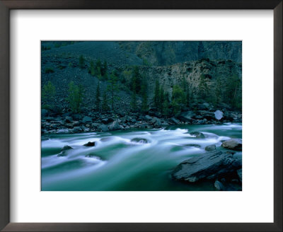 The Mist-Filled Tides Of Clearwater River Quickly Rush Down The Rocky Mountain Landscape by Barry Tessman Pricing Limited Edition Print image