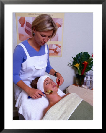 Woman Receiving Facial Treatment At Health Spa, Napa Valley, California, Usa by Roberto Gerometta Pricing Limited Edition Print image