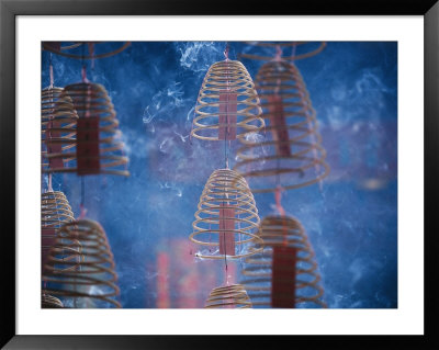 Spirals Of Incense Burn In A Buddhist Temple In Kuala Lumpur by Steve Raymer Pricing Limited Edition Print image