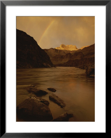 A Rainbow Over The Colorado River In Grand Canyon National Park by Dugald Bremner Pricing Limited Edition Print image