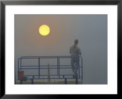 Early Morning Fisherman In Fog And Sunrise by Dennis Macdonald Pricing Limited Edition Print image