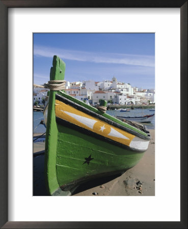Fishing Boat And Village Near Portimac, Ferragudo, Algarve, Portugal, Europe by Tom Teegan Pricing Limited Edition Print image