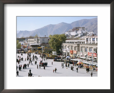 Main Square In Front Of Jokhang, Potala Palace Beyond, Lhasa, Tibet, China by Tony Waltham Pricing Limited Edition Print image
