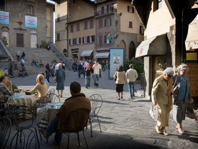 People Walking Around The Piazza Della Pescheria, Cortona, Tuscany, Italy by Robert Eighmie Pricing Limited Edition Print image