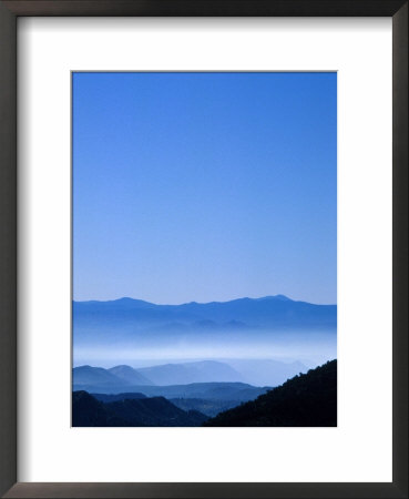 Mountainside At Sunrise by Fogstock Llc Pricing Limited Edition Print image