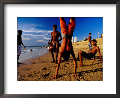Boy Playing On Galle Beach, Colombo, Western, Sri Lanka by Richard I'anson Pricing Limited Edition Print image