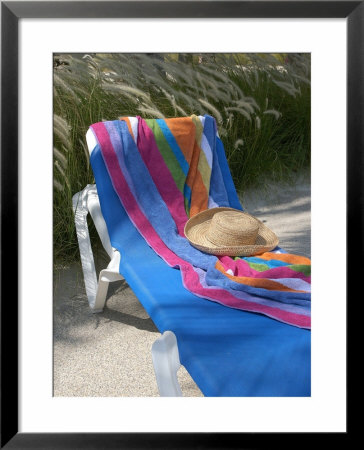 Hat And Towel On Lounge Chair, Aruba, Caribbean by Lisa S. Engelbrecht Pricing Limited Edition Print image