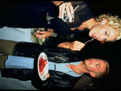 David Faustino Feeding Jennie Garth Strawberries At Party Announcing The Fox Network's New Shows by Dave Allocca Pricing Limited Edition Print image