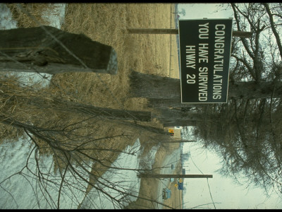 Sign Congratulations You Have Survived Highway 20 At End Of Treacherous Stretch by Ralph Crane Pricing Limited Edition Print image