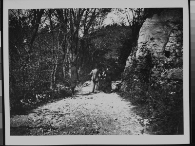 Well-Dressed Men And Women Walking In The Austria Glen Near Jefferson by Wallace G. Levison Pricing Limited Edition Print image