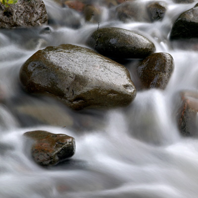 Stones In Stream Of Water by Vigfus Birgisson Pricing Limited Edition Print image