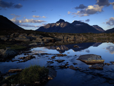 Reflection Of Mountains In Water, Sarek National Park, Lapland, Sweden by Anders Ekholm Pricing Limited Edition Print image