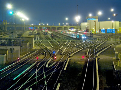 Train Yard At Night, Los Angeles by Geoffrey George Pricing Limited Edition Print image