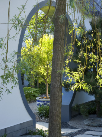 Arch In Moongate Creates Vista With Citrus Tree In Pot, (Chelsea 2007), Designer: Lesley Bremnes by Clive Nichols Pricing Limited Edition Print image