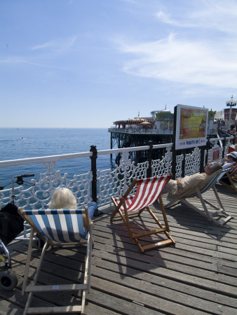 Deckchairs On Brighton Pier, Brighton, Sussex, England by Natalie Tepper Pricing Limited Edition Print image