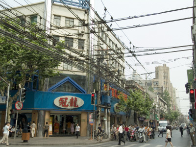 Tram Wires, Nanjing Road, Shanghai, China by Natalie Tepper Pricing Limited Edition Print image
