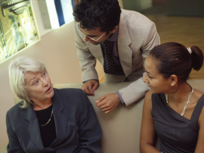 Office Life And Interiors, Three People In Conversation by Nicholas Kane Pricing Limited Edition Print image