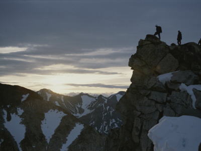 A Group Of Climbers Silhouetted Atop A Rocky Promontory by George F. Mobley Pricing Limited Edition Print image