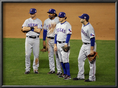 Texas Rangers V San Francisco Giants, Game 2: Michael Young, Ian Kinsler, Elvis Andrus, Mitch Morel by Jed Jacobsohn Pricing Limited Edition Print image
