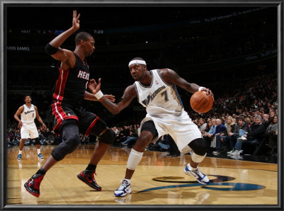 Miami Heat V Washington Wizards: Andray Blatche And Chris Bosh by Ned Dishman Pricing Limited Edition Print image