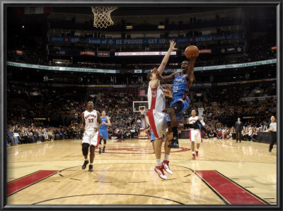 Oklahoma City Thunder V Toronto Raptors: Jeffgreen And Andreabargnani by Ron Turenne Pricing Limited Edition Print image