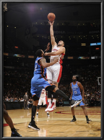 Oklahoma City Thunder V Toronto Raptors: Morris Peterson And Linas Kleiza by Ron Turenne Pricing Limited Edition Print image